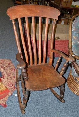 Lot 1213 - A 19th century armchair on rocker base