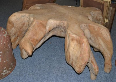 Lot 1231 - Carved coffee table of naturalistic form