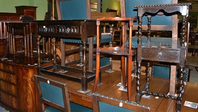 Lot 1352 - A reproduction nest of three oak occasional tables, a similar two drawer side table, small oak...