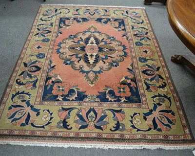 Lot 1359 - Peach ground rug, probably Turkish/Afghan Wauroz?