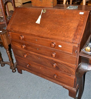 Lot 1368 - A Georgian mahogany bureau