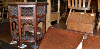 Lot 1369 - An Eastern folding table with brass inlay and a similar stationary box