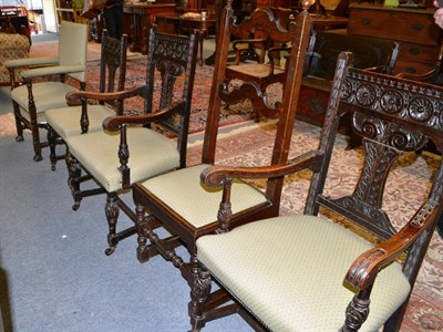 Lot 1386 - A pair of 19th century carved oak armchairs, a similar dining chair, an oak ladderback chair...