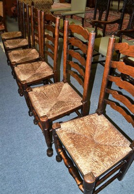 Lot 1388 - Set of six ladderback chairs with rush seats