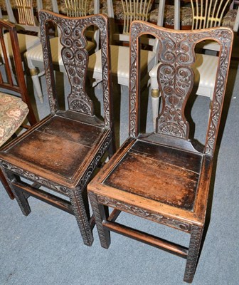 Lot 1391 - Pair of carved oak George III chairs