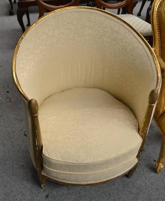 Lot 1400 - A French giltwood tub armchair