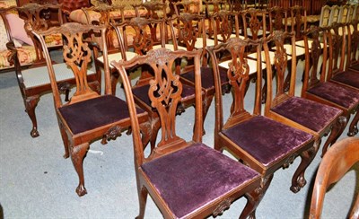 Lot 1402 - A set of twenty George III style mahogany dining chairs, comprising eighteen singles and two...