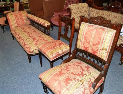 Lot 1403 - A late Victorian mahogany framed salon suite including chaise longue, a pair of chairs and two...