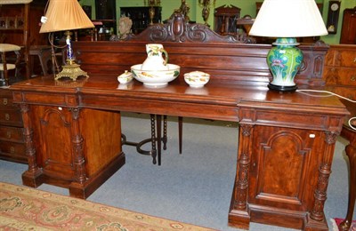 Lot 1412 - A large Victorian mahogany break front sideboard