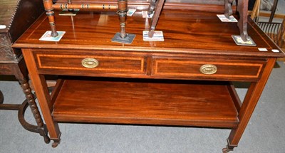 Lot 1415 - An Edwardian Sheraton Revival crossbanded mahogany dumbwaiter