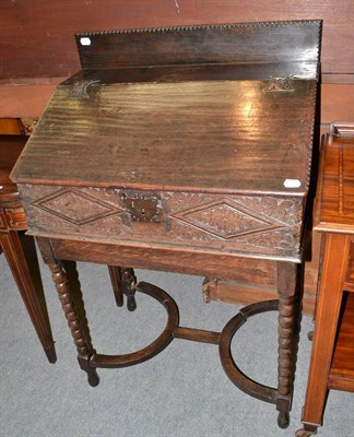 Lot 1417 - An 18th century oak bible box on later stand