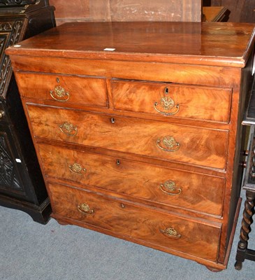 Lot 1440 - A Georgian mahogany four height chest of drawers