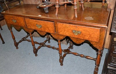 Lot 1442 - A burr walnut veneered sideboard