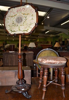 Lot 1443 - A Victorian mahogany fire screen with embroidered inserts and a mahogany revolving piano stool