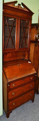 Lot 1449 - A mahogany bureau bookcase of small proportions