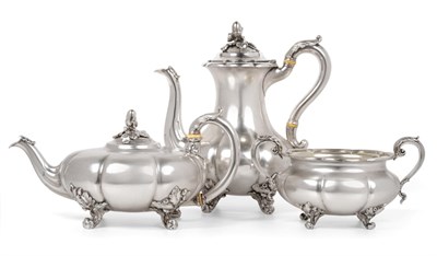 Lot 537 - A William IV Silver Three Piece Tea and Coffee Service, Paul Storr, London 1836/37, of melon fluted