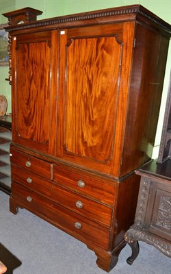 Lot 1456 - A George III linen press (with removable shelves in upper part)