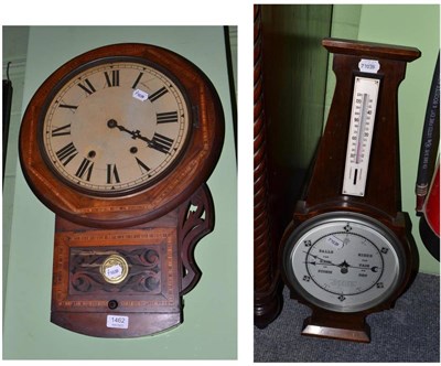 Lot 1462 - A mahogany inlaid drop dial wall clock and a 1930s oak framed barometer