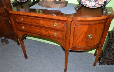 Lot 1465 - A reproduction mahogany bow front sideboard