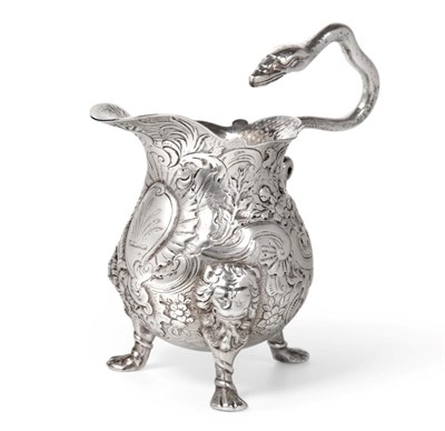 Lot 556 - A George II Irish Silver Cream Jug, maker's mark only for John Hamilton, Dublin circa 1730/40,...