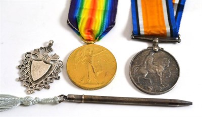 Lot 8 - WWI medals, a silver medallion and pencil