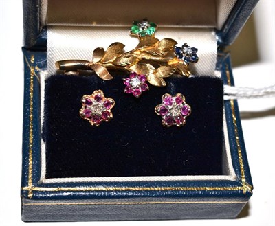Lot 16 - A pair of diamond and ruby cluster earrings and a gem set floral brooch