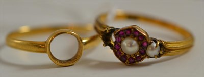 Lot 18 - A ruby and split pearl ring (a.f.) and a ring mount with missing stone (2)