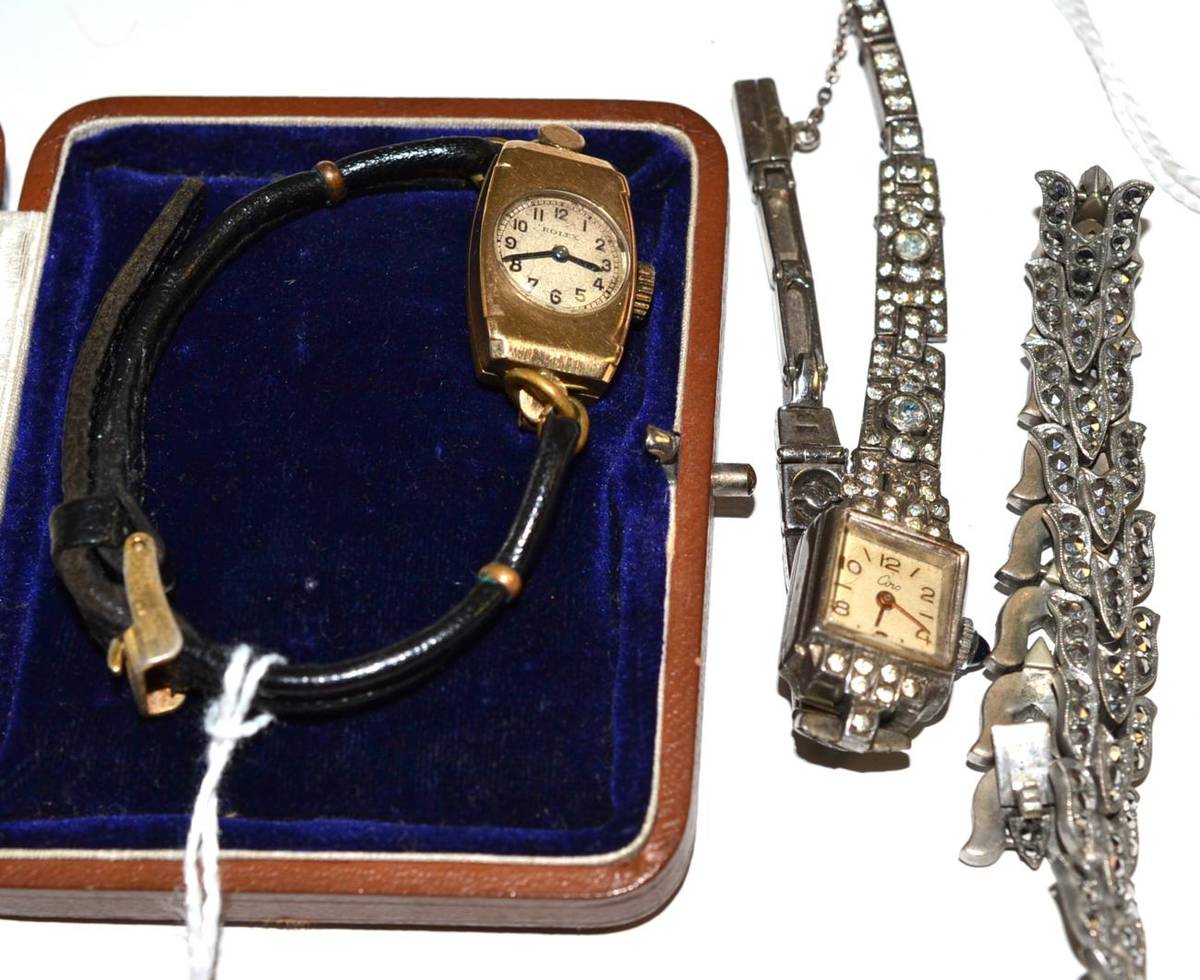 Lot 30 - A lady's 9ct Rolex watch, a lady's cocktail watch, bracelet strap and a paste bracelet