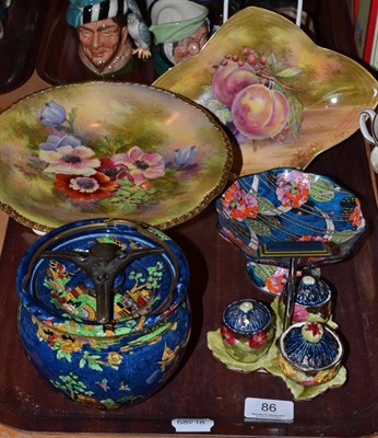 Lot 86 - A Royal Winton tazza painted with flowers by Austin, a similar dish, a tobacco jar, cruet and tazza