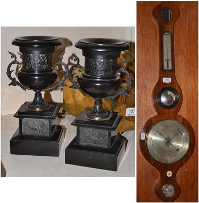 Lot 100 - Pair of French black marble urns with metal mounts and a wheel barometer (a.f.)