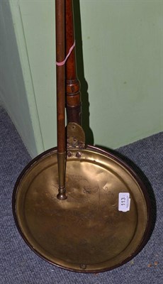 Lot 113 - A 19th century brass and copper warming pan and a copper coaching horn