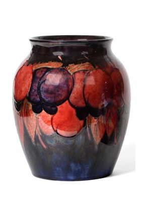 Lot 578 - William Moorcroft (British, 1872-1945): A Flambé Wisteria Pattern Vase, impressed MOORCROFT...