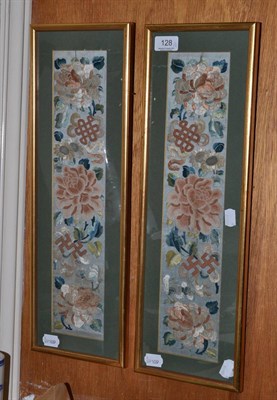 Lot 128 - A pair of framed embroidered panels