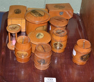 Lot 133 - A collection of Mauchline ware comprising: a bobbin box, a powder box, an egg timer, a trinket...