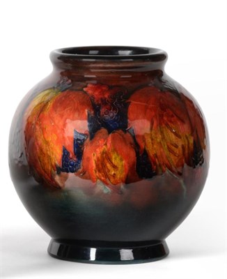 Lot 580 - William Moorcroft (British, 1872-1945): A Flambé Leaf and Berry Pattern Vase, impressed MADE...