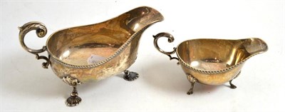 Lot 149 - A good silver sauce boat in the Rococo style, London 1901, and another Birmingham 1931