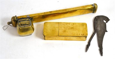 Lot 157 - A 19th century steel nutcracker, a brass combination pipe/tobacco box and a brass quill/inkwell