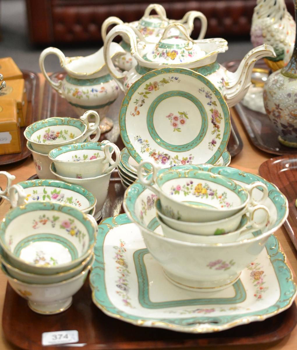 Lot 374 - A Rockingham type tea service decorated with
