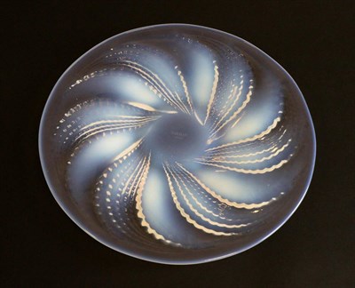 Lot 621 - René Lalique (French, 1860-1945): An Opalescent and Clear Glass Fleurons Plates, No.2, the...