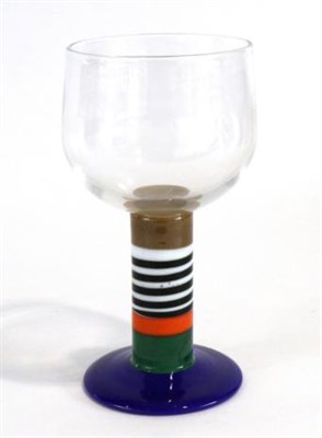 Lot 626 - Gunnar Cyren (Swedish, 1931-2013) for Orrefors: A Pop Glass Goblet, clear bowl on a banded stem and