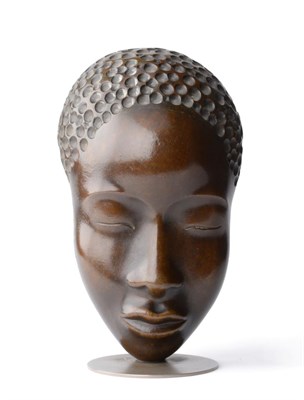 Lot 635 - A Werkstatte Hagenauer Wien Bronze African Female Mask, circa 1930, on a circular aluminium...