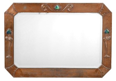 Lot 638 - An Arts & Crafts Mirror, the rectangular beaten copper frame with three Ruskin pottery...