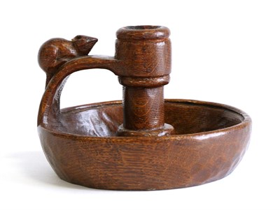 Lot 656 - Mouseman: A Robert Thompson English Oak Chamber Candlestick, of circular form, the handle with...