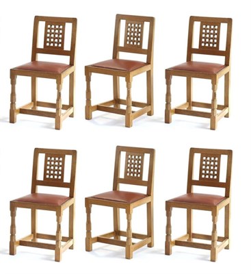 Lot 667 - Mouseman: A Set of Six Robert Thompson English Oak Lattice Back Dining Chairs, with Mulberry...