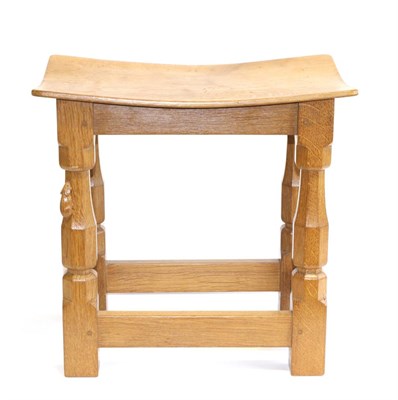 Lot 671 - Mouseman: A Robert Thompson English Oak Dish Topped Stool, the top on four octagonal legs joined by