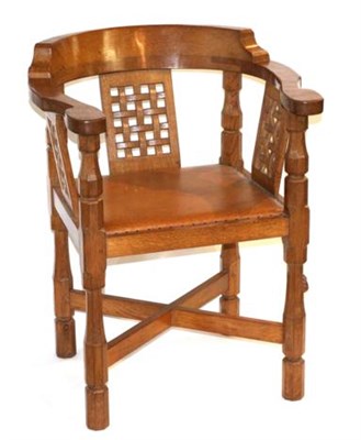 Lot 679 - Mouseman: A Robert Thompson Oak Monk's Chair, with curved back and shaped arms, over three...