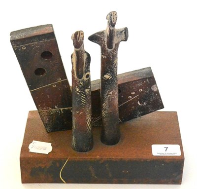 Lot 7 - John Maltby (b.1936): A Ceramic Sculpture ";Two Figures (Ironman)";, on a folded metal base...