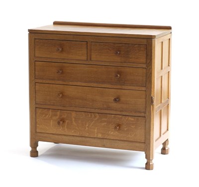 Lot 687 - Mouseman: A Robert Thompson English Oak Chest of Drawers, with raised upstand, above two short over