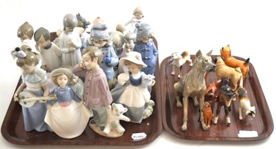 Lot 51 - A quantity of ceramic models and figures including Lladro, Nao, Beswick, Royal Doulton etc (on...