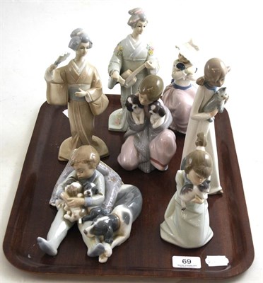 Lot 69 - A quantity of Spanish porcelain figures comprising of three Lladro figures, one Nao figure and...